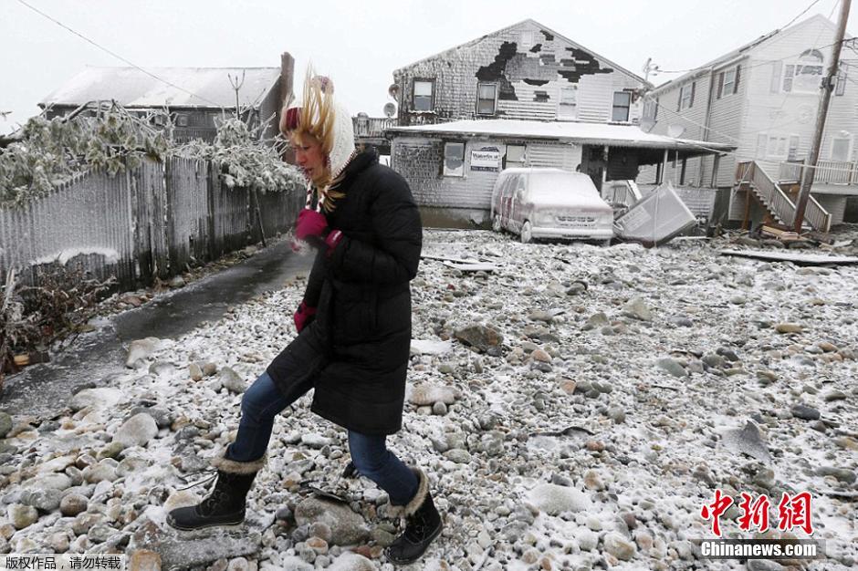 美国马萨诸塞州遭受暴雪洪水双重袭击