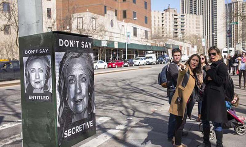 希拉里宣布竞选美国总统 纽约街头出现反对海报(组图)