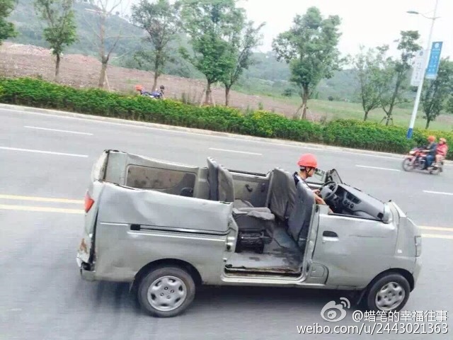 面包车被改成“敞篷车” 司机上路戴头盔