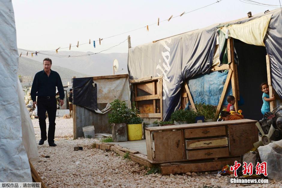 英首相卡梅伦前往黎巴嫩 慰问当地叙利亚难民