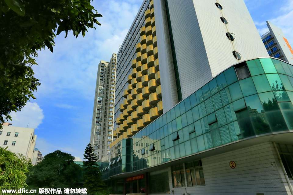 广州党校金色“铜钱”办公楼豪华夺目
