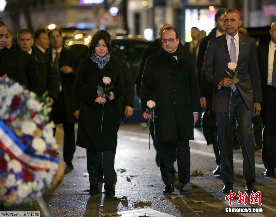 巴黎气候大会与会领导人献花 悼念恐袭遇难者