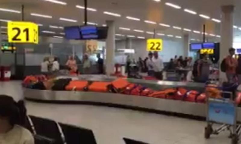 英奥运代表团机场取行李 全团红色大写懵圈