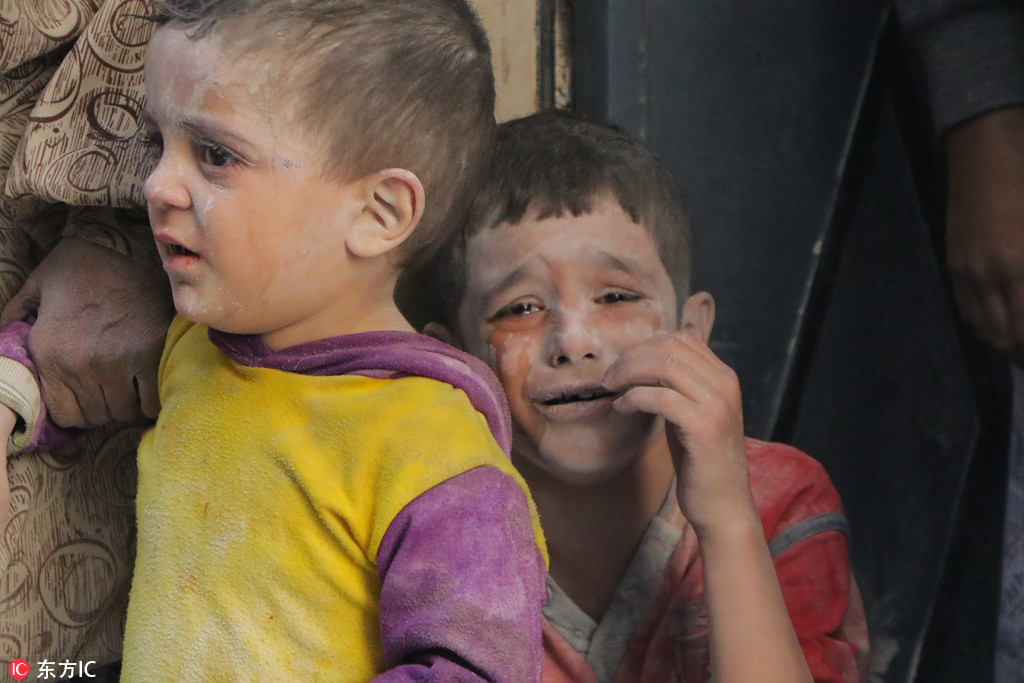 俄罗斯战机空袭阿勒颇居民区 儿童被炸伤令人痛心