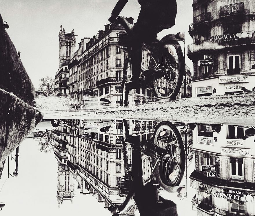 摄影师捕捉倒影中的巴黎 场景似平行世界