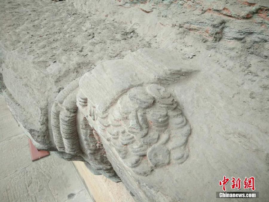 重庆大足石刻首次发现宋代纸币“交子”造像